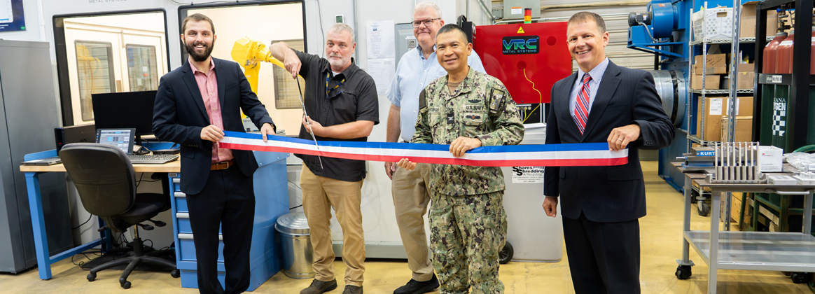 NSWC Crane holds the ribbon cutting of our new Metal Additive Manufacturing (MADMAN) Repair Center on June 23. 